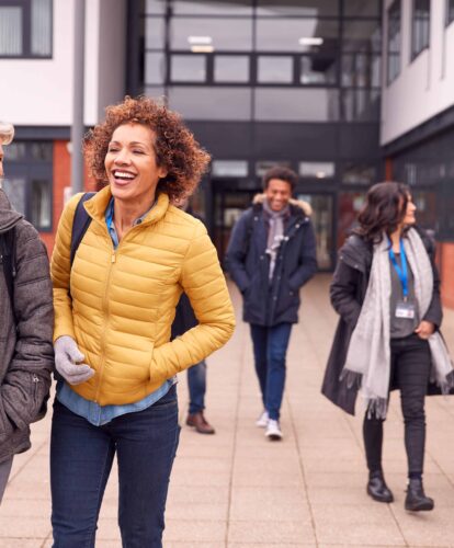 Colleagues walking along having a conversation