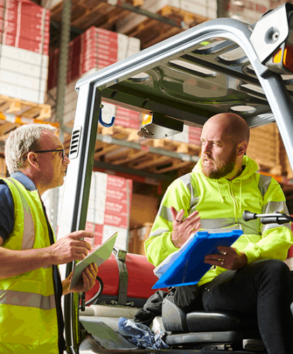 two colleagues working in a warehouse