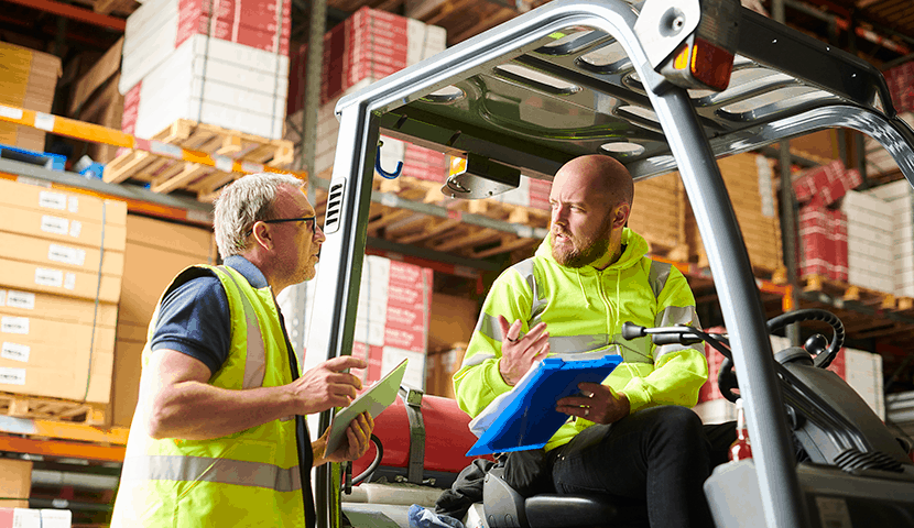 two colleagues working in a warehouse