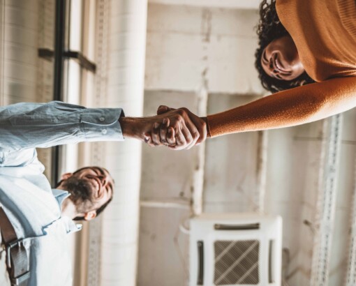 Two people shaking hands