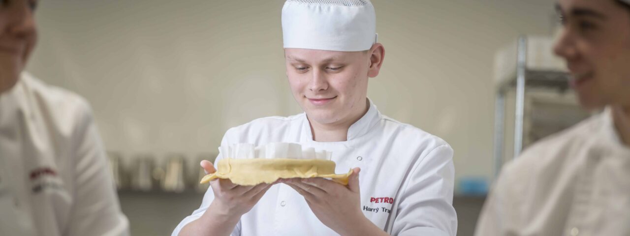 Hospitality and catering students preparing food