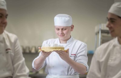 Hospitality and catering students preparing food