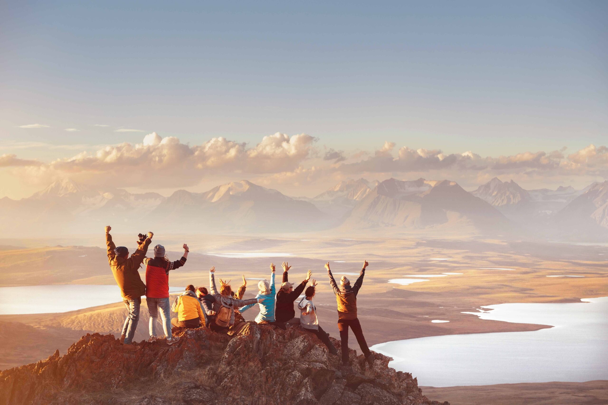 Large group of happy friends in mountains area