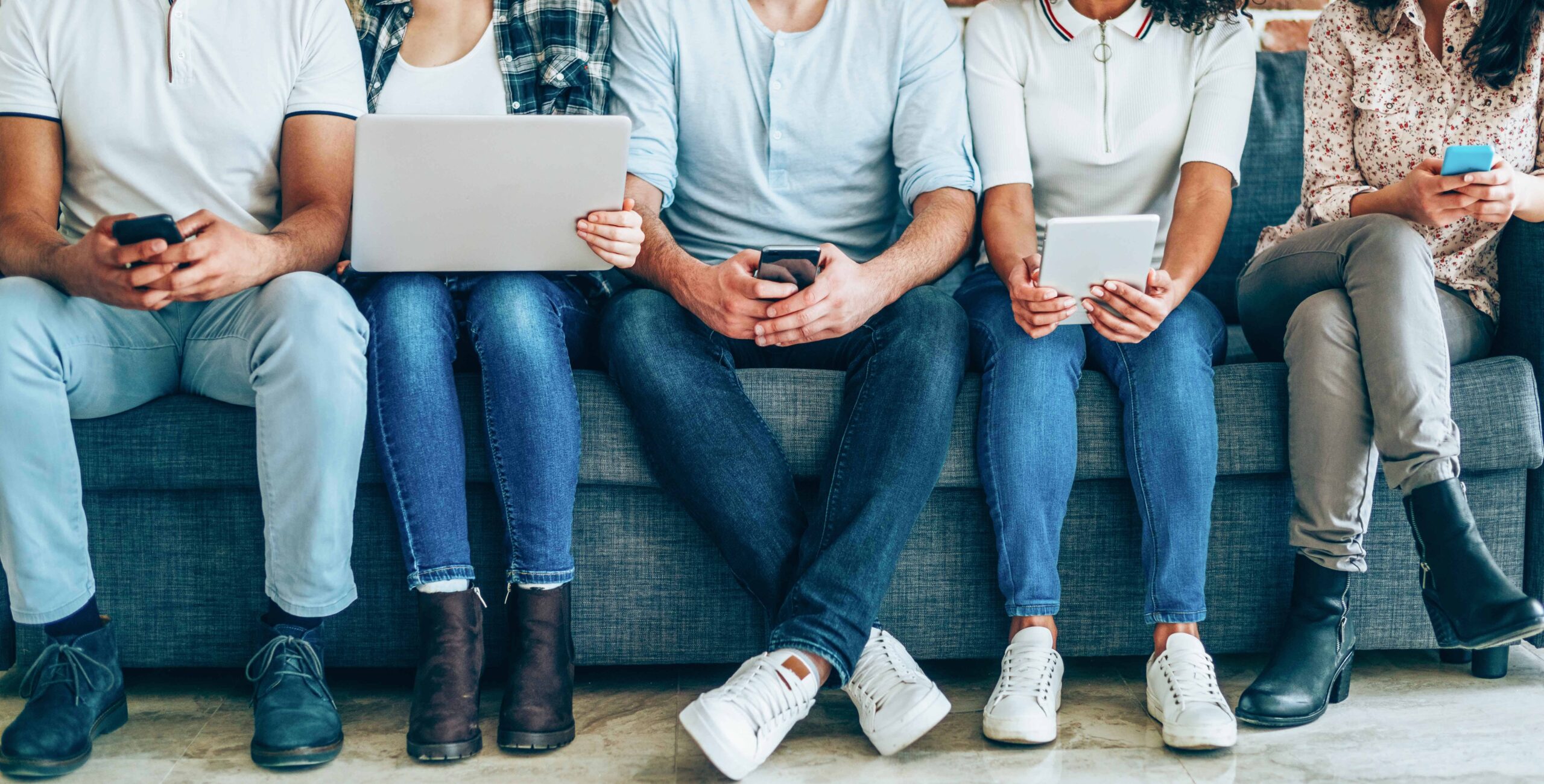 A group of people using smart devices