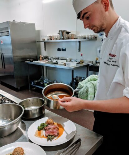 Hospitality and catering students preparing food in the Taw Restaurant