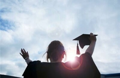 Graduate celebrating