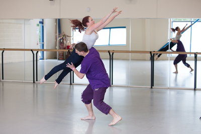Two students dancing in the dance studio