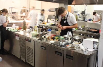 Students preparing food in Petroc kitchens