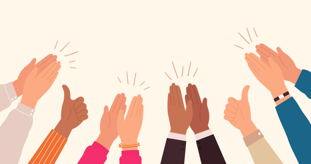 An illustration of a group of hands clapping
