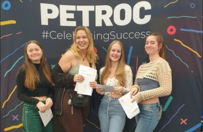 Students celebrating A Level results