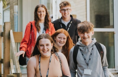 Group of Petroc students smiling at the camera