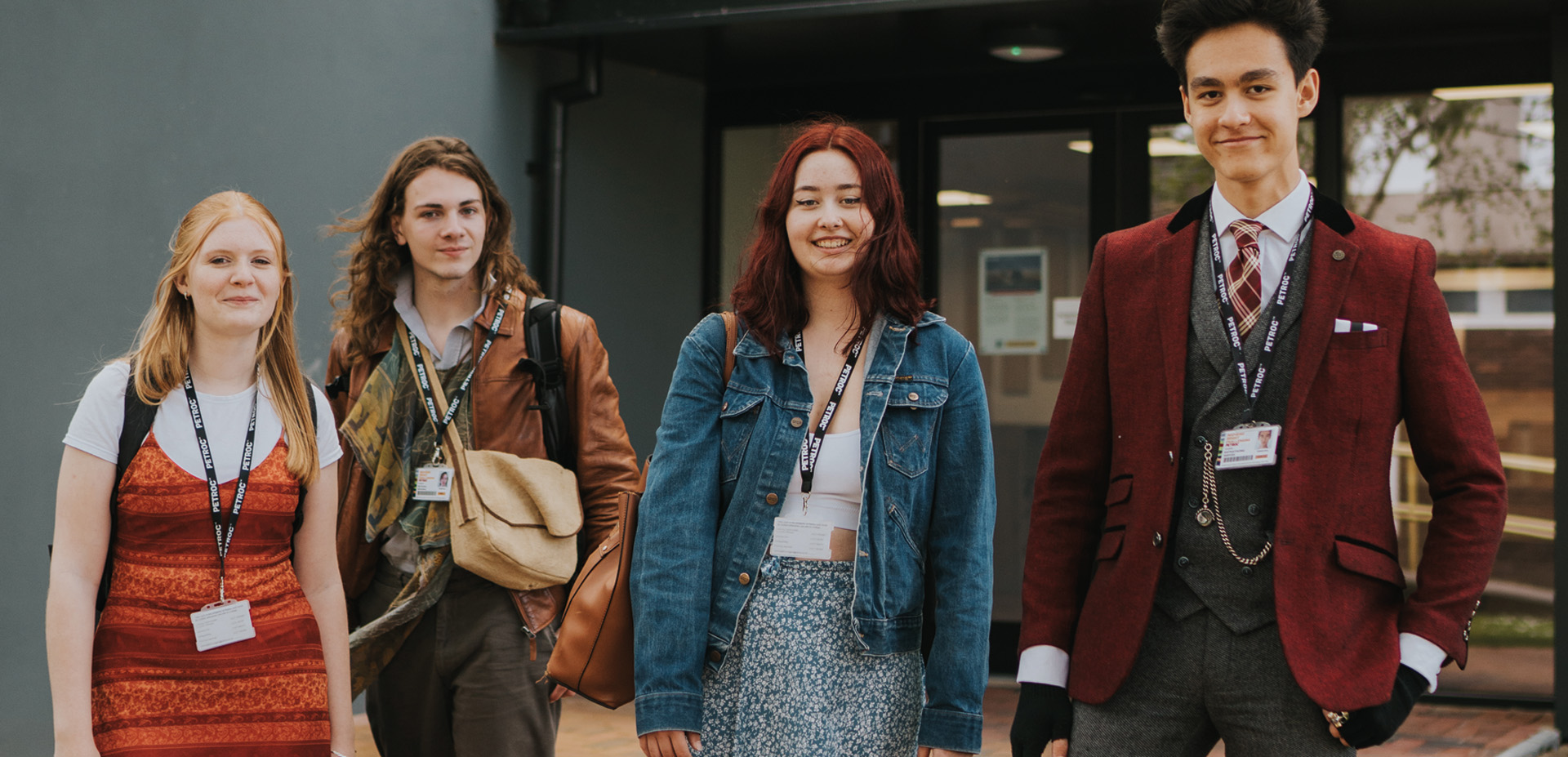 Four Petroc Students Smiling at the camera