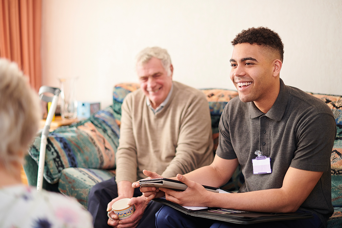 young carer with older gentleman