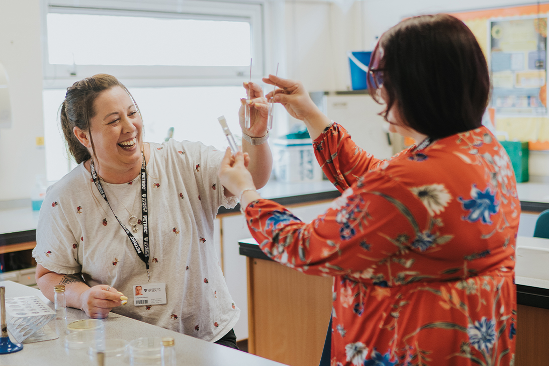 Women in a science lab studying a science degree