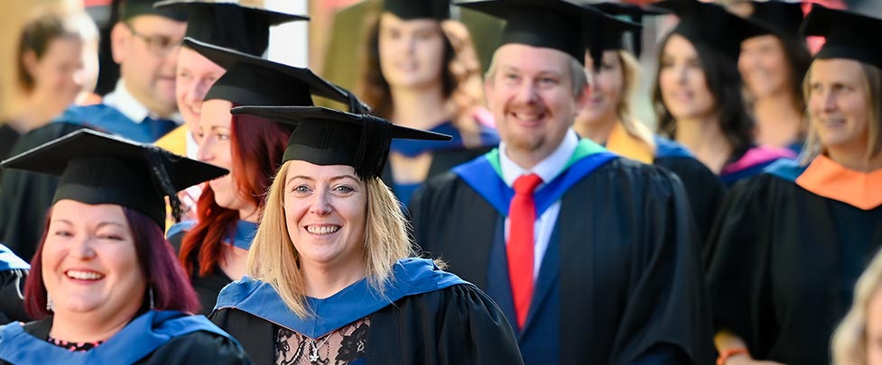 2022 Petroc Graduation 266.jpg Graduands in mortar boards and cloaks