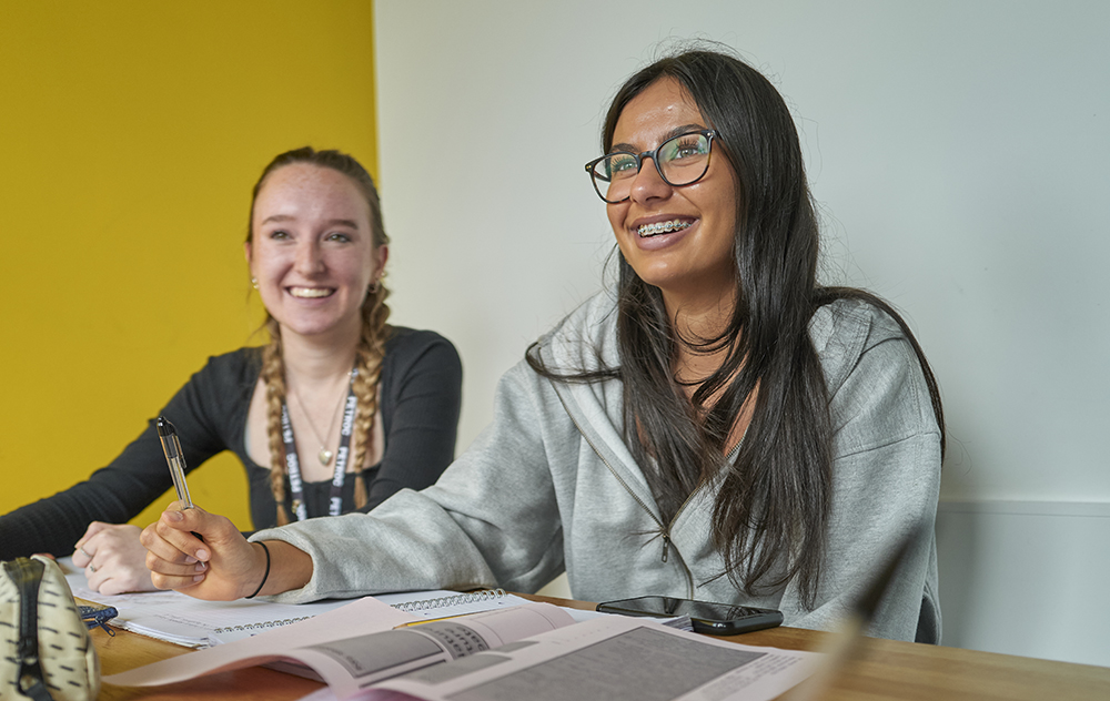 Petroc Two students a their desk