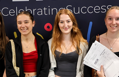 Group of students receiving A level results