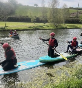 Students on paddleboards
