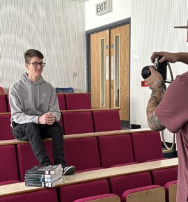 Alumni student being photographed