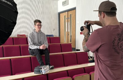 Alumni student being photographed